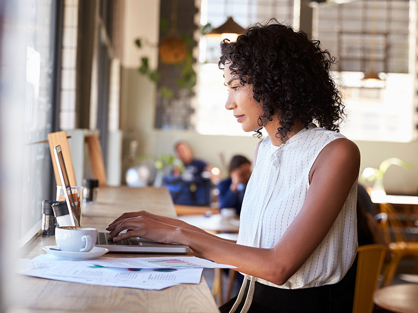 woman using SEO search on her laptop while working